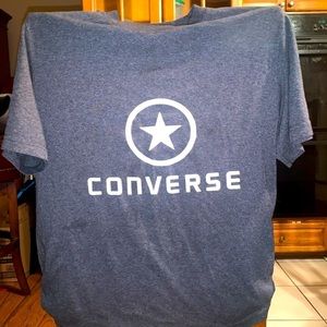 This is an adult medium Converse shirt